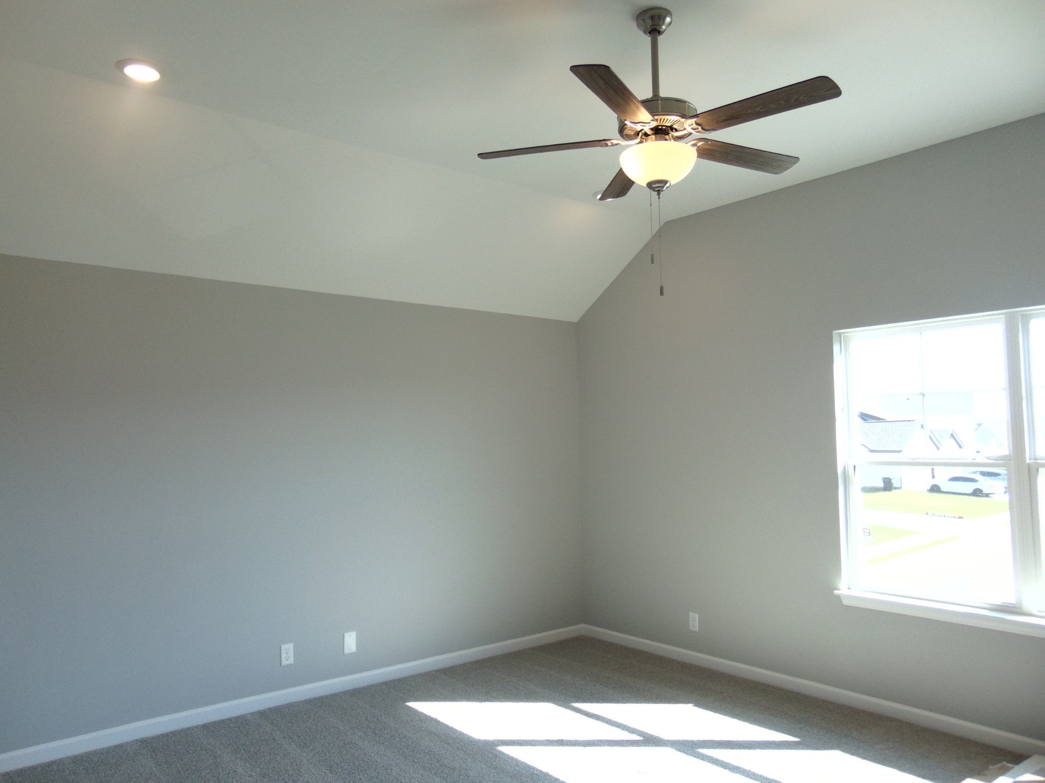 279 Spring Street La Vergne, TN 37086 - Photo 29 of 31 an empty room with a window and a fan