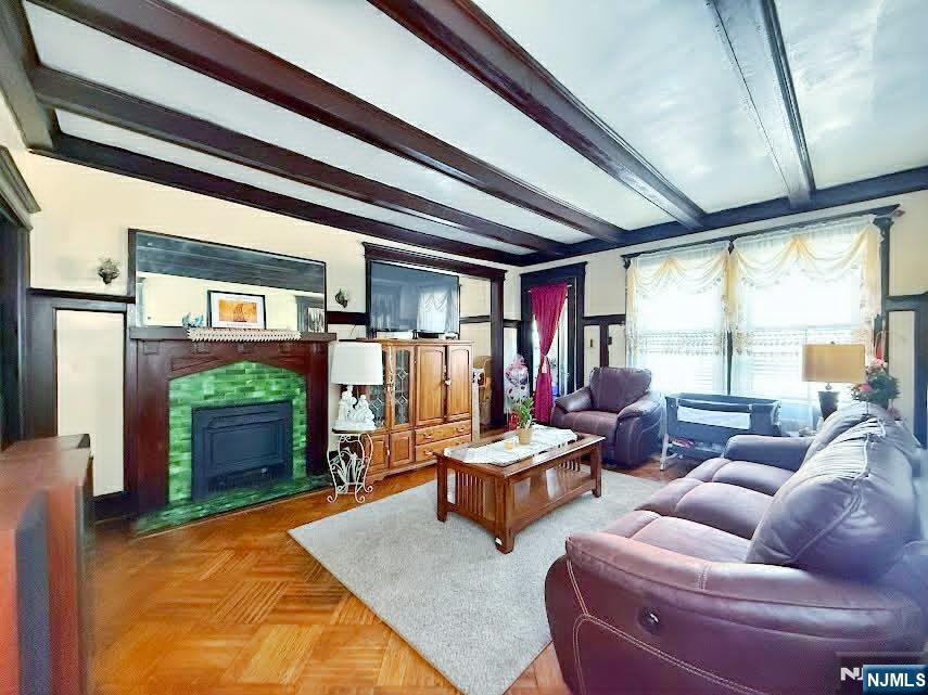 102 State Street Bloomfield, NJ 07003 - Photo 4 of 11 a living room with patio furniture and a fireplace