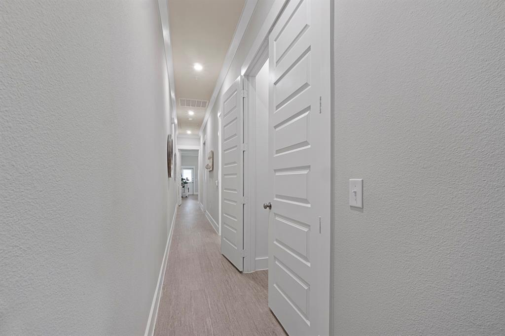 579 Lloyd's Road, Unit 821A Little Elm, TX 75068 - Photo 11 of 25 wooden floor in a gallery