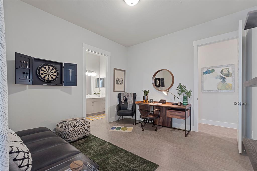 579 Lloyd's Road, Unit 821A Little Elm, TX 75068 - Photo 16 of 25 a living room with furniture