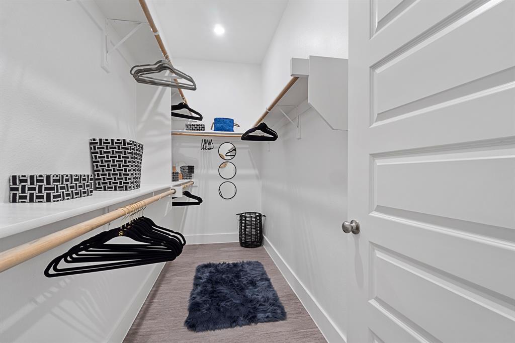 579 Lloyd's Road, Unit 821A Little Elm, TX 75068 - Photo 21 of 25 a room with gym equipment and wooden floor