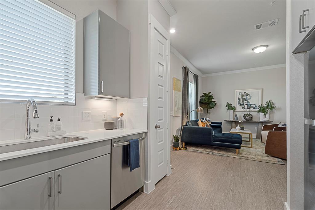 579 Lloyd's Road, Unit 821A Little Elm, TX 75068 - Photo 10 of 25 a view of a living room kitchen and a window