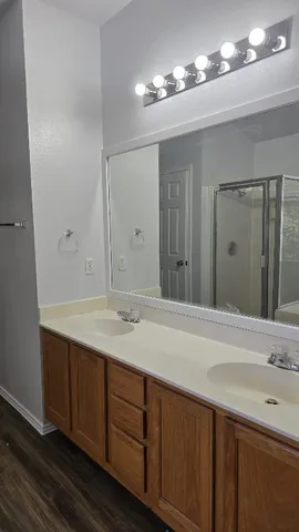 a bathroom with a sink and a mirror