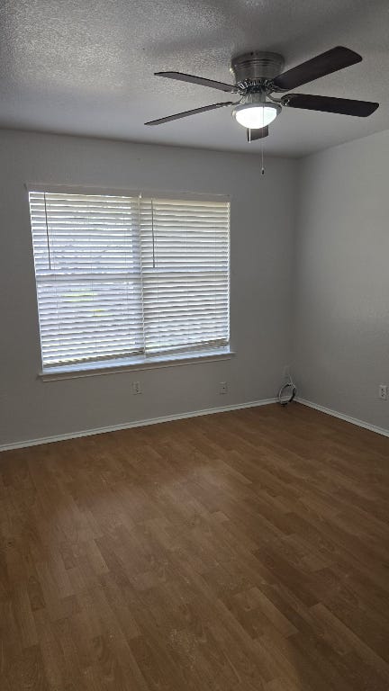 7704 Earp Way Austin, TX 78729 - Photo 15 of 20 a view of an empty room with a window