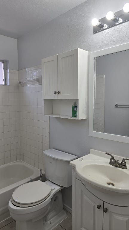 7704 Earp Way Austin, TX 78729 - Photo 17 of 20 a bathroom with a sink toilet and shower