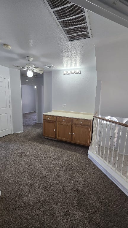 7704 Earp Way Austin, TX 78729 - Photo 6 of 20 a view of a livingroom with a staircase