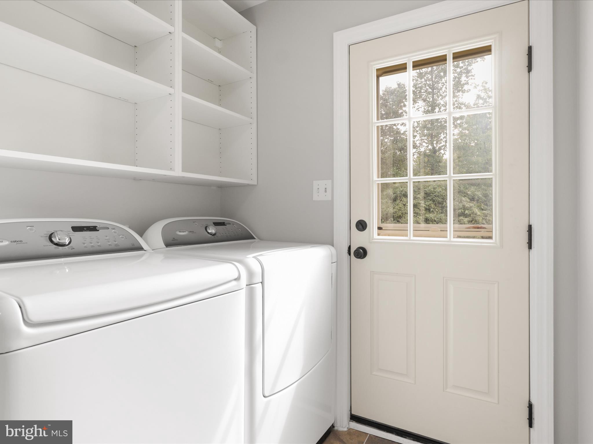 7533 Hollindale Court Alexandria, VA 22306 - Photo 15 of 78 a utility room with dryer and washer