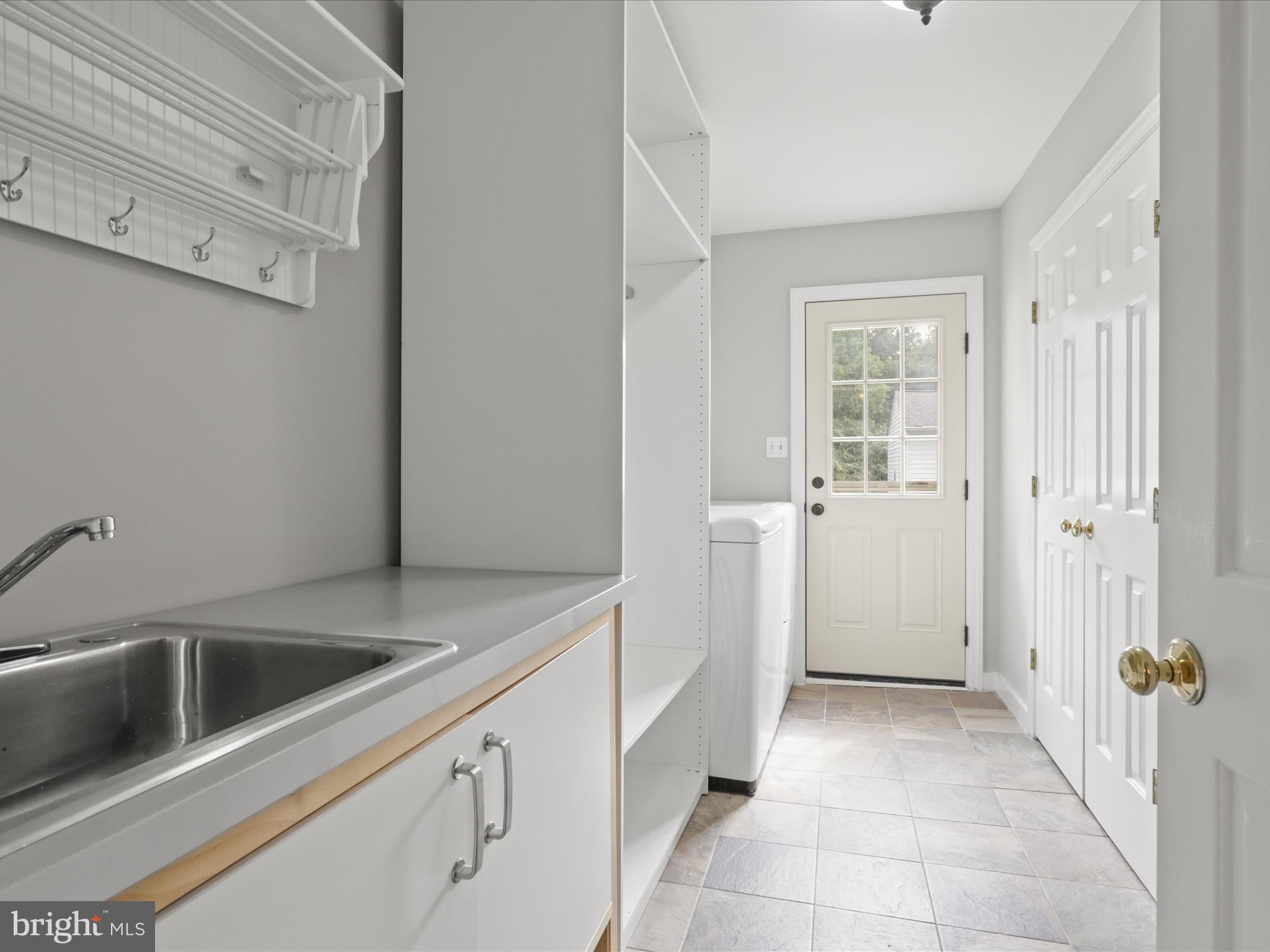 7533 Hollindale Court Alexandria, VA 22306 - Photo 16 of 78 Main level laundry suite and mudroom