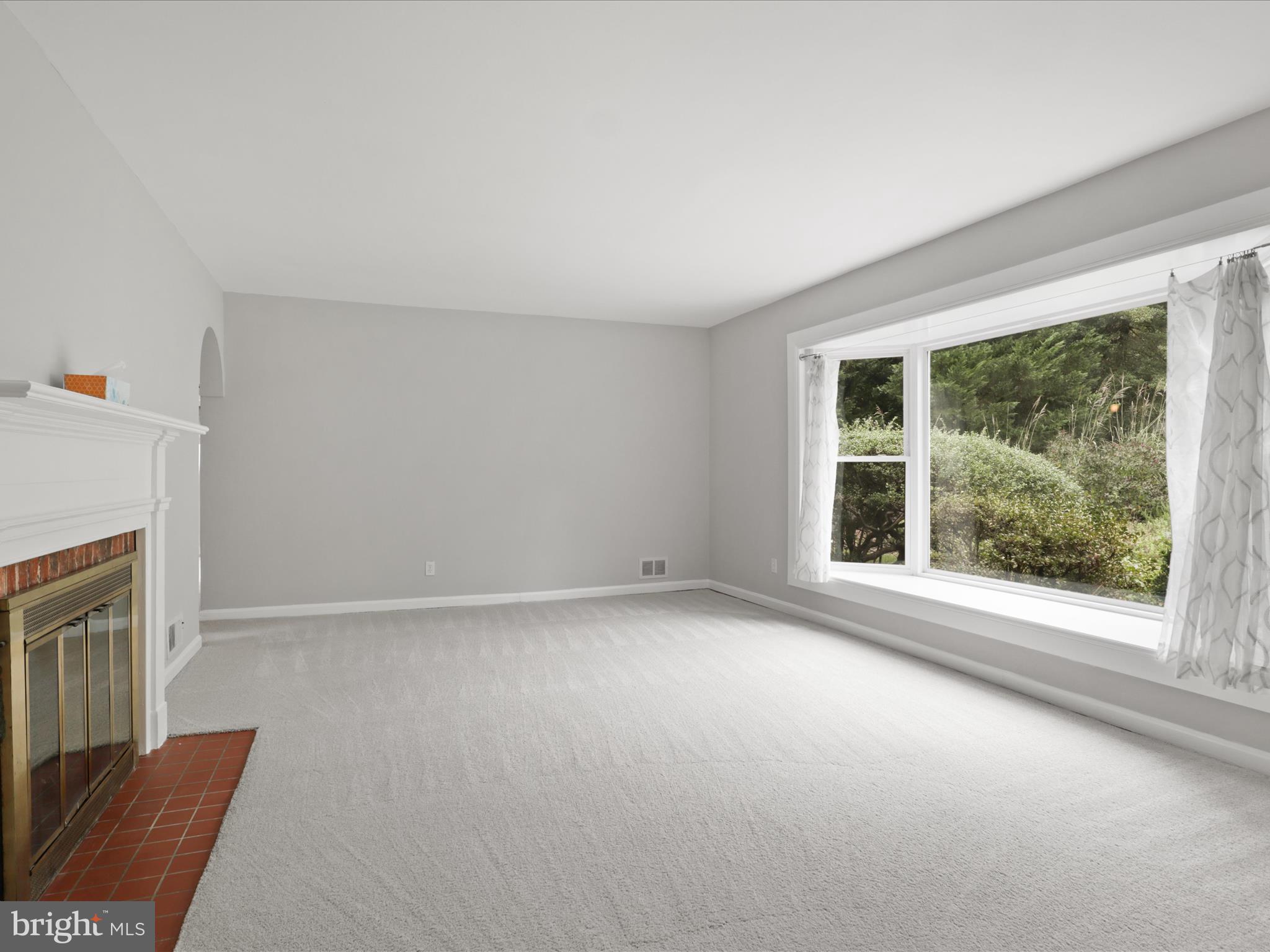7533 Hollindale Court Alexandria, VA 22306 - Photo 18 of 78 Living room with bay window & w/b fireplace.