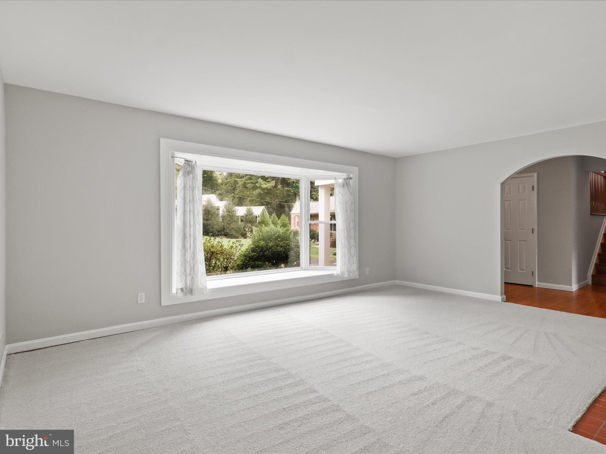 7533 Hollindale Court Alexandria, VA 22306 - Photo 20 of 78 Living room with bay window & w/b fireplace.