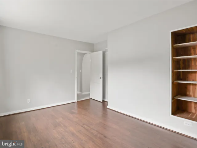 a bathroom with a sink a mirror and a shower