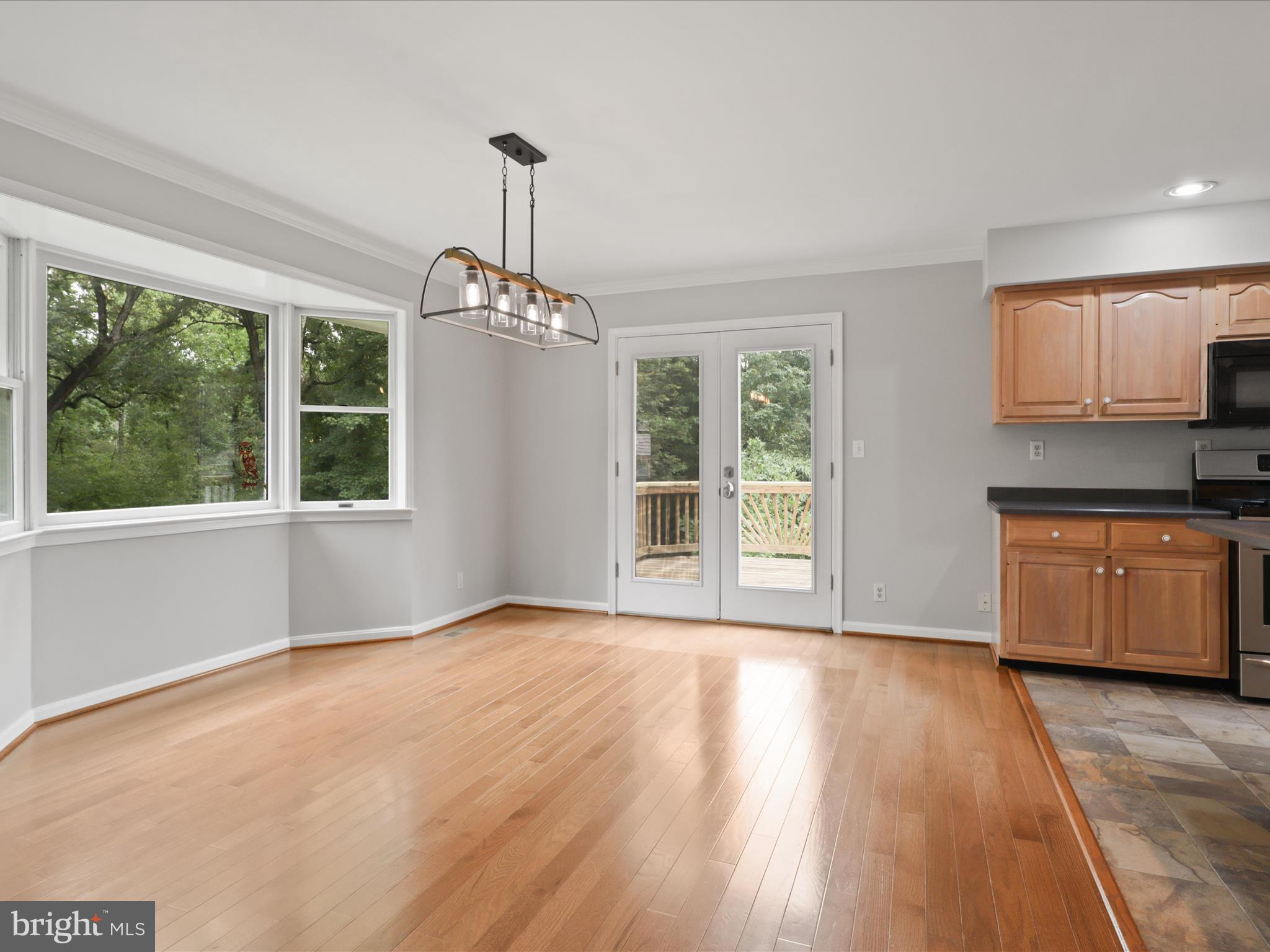 7533 Hollindale Court Alexandria, VA 22306 - Photo 38 of 78 Casual dining area opens to deck