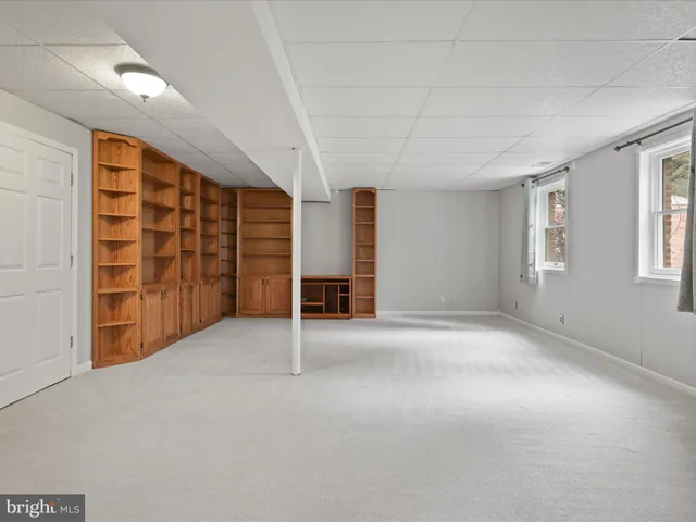 a view of balcony with furniture and trees