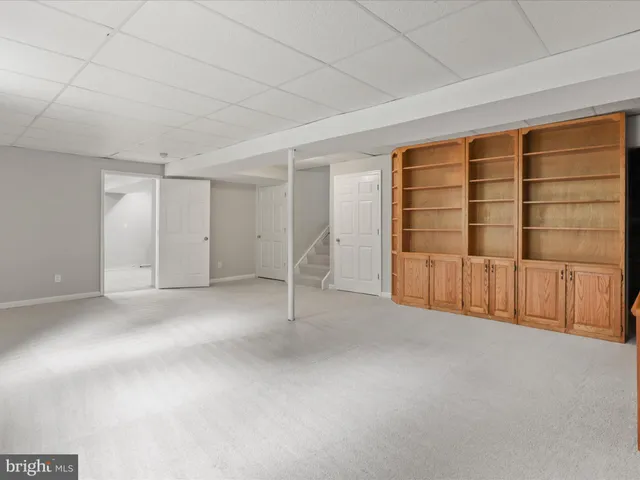 a sign that is sitting on a wooden floor