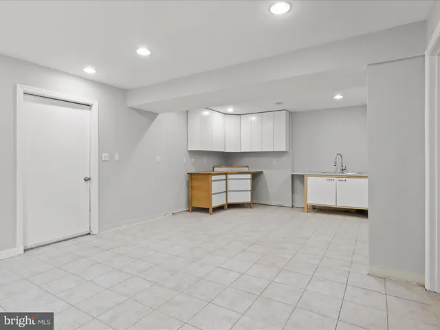 a picture of a room with a white wall and a white wall