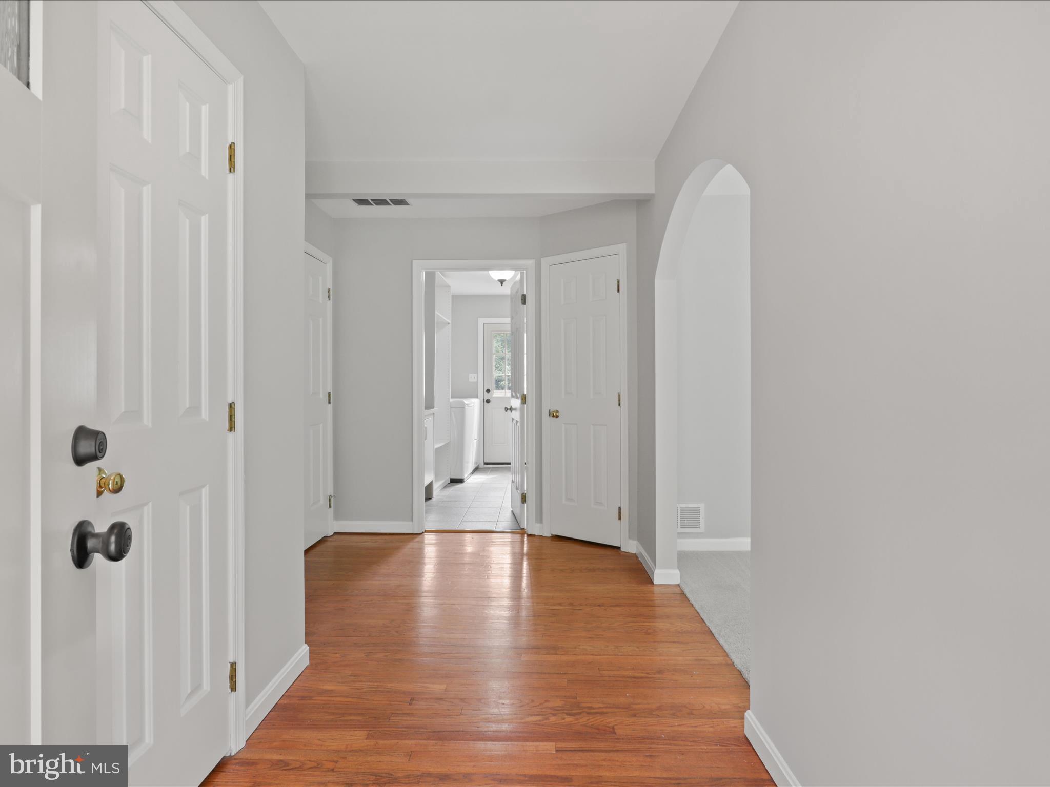 7533 Hollindale Court Alexandria, VA 22306 - Photo 9 of 78 Foyer with hardwood floors