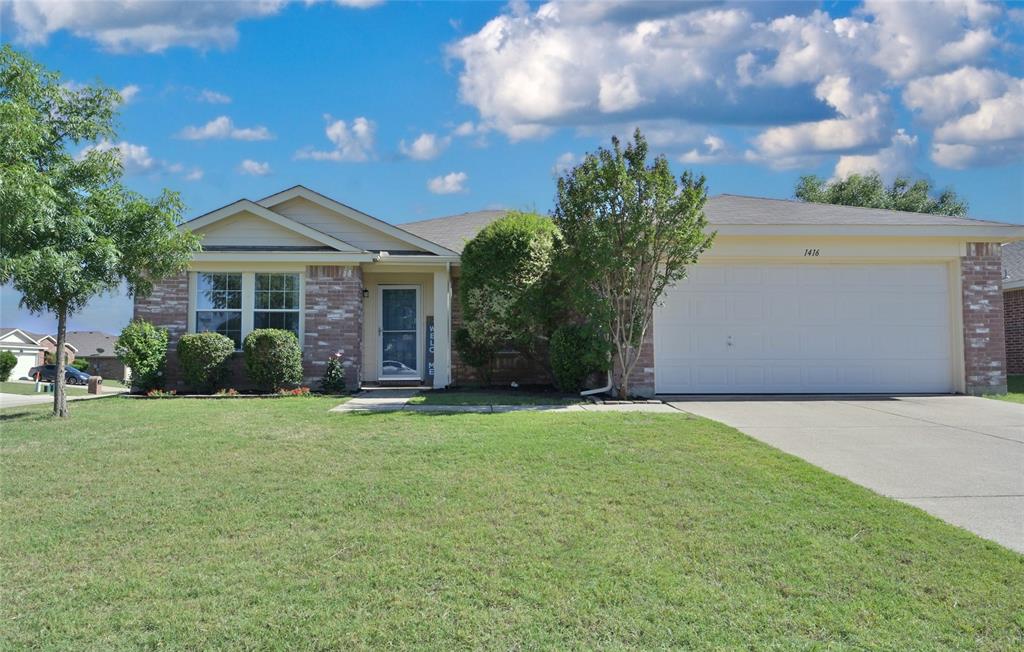 1416 Aztec Trail Krum, TX 76249 - Photo 1 of 1 a front view of a house with a garden