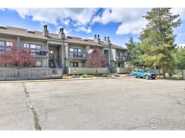 a view of a building with a street