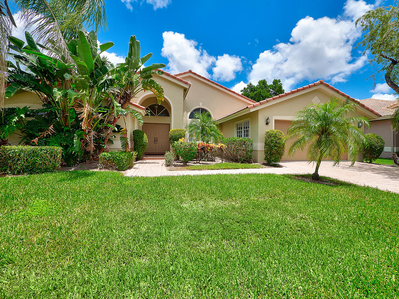 7044 Falls Road East Boynton Beach, FL 33437 - Photo 1 of 22 Front Exposure