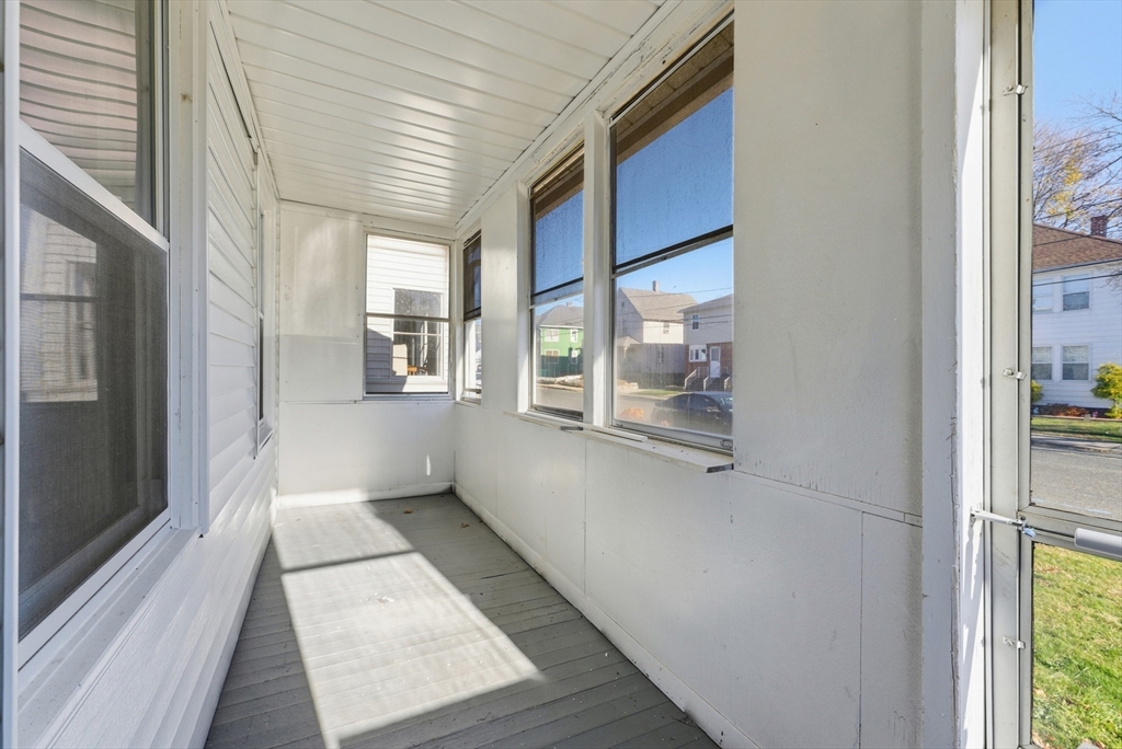 287 East Street Ludlow, MA 01056 - Photo 21 of 42 a view of an entryway with wooden floor and windows