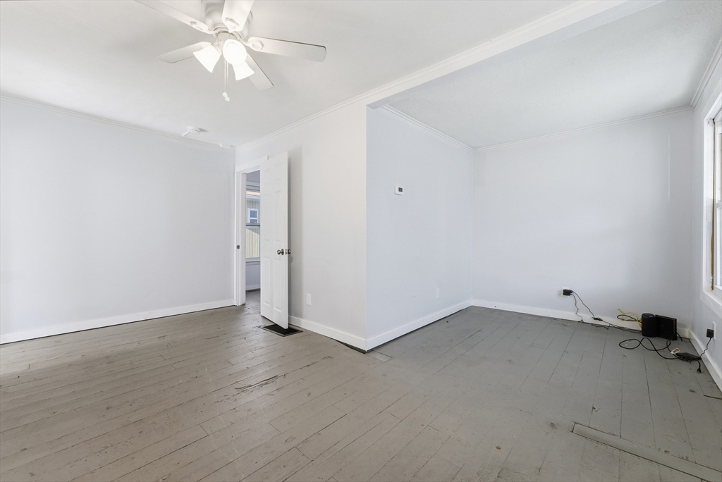 287 East Street Ludlow, MA 01056 - Photo 23 of 42 a view of an empty room with a fan