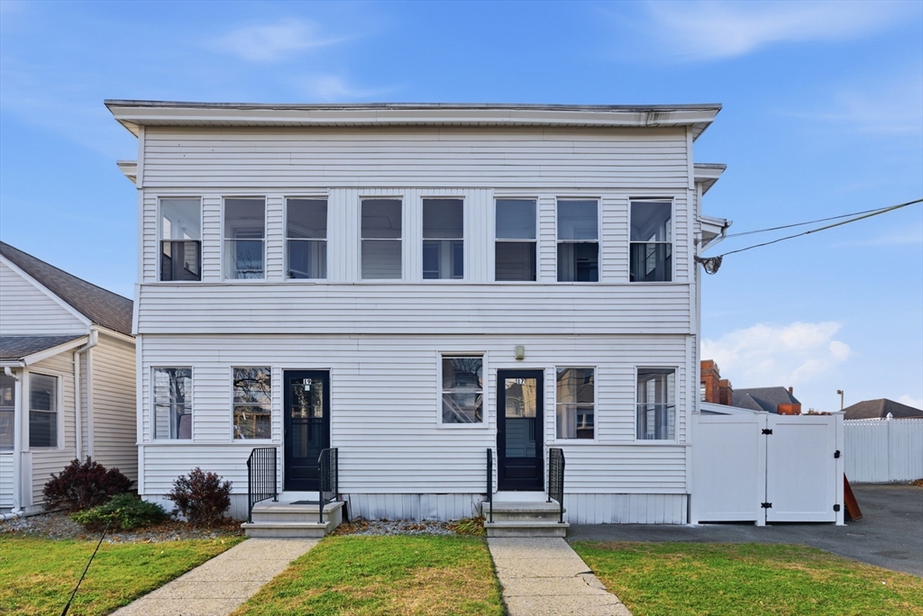 287 East Street Ludlow, MA 01056 - Photo 28 of 42 a front view of a house with a yard