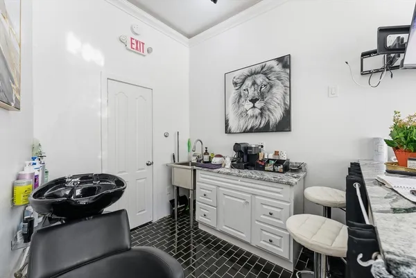 a kitchen with a cabinets and furniture