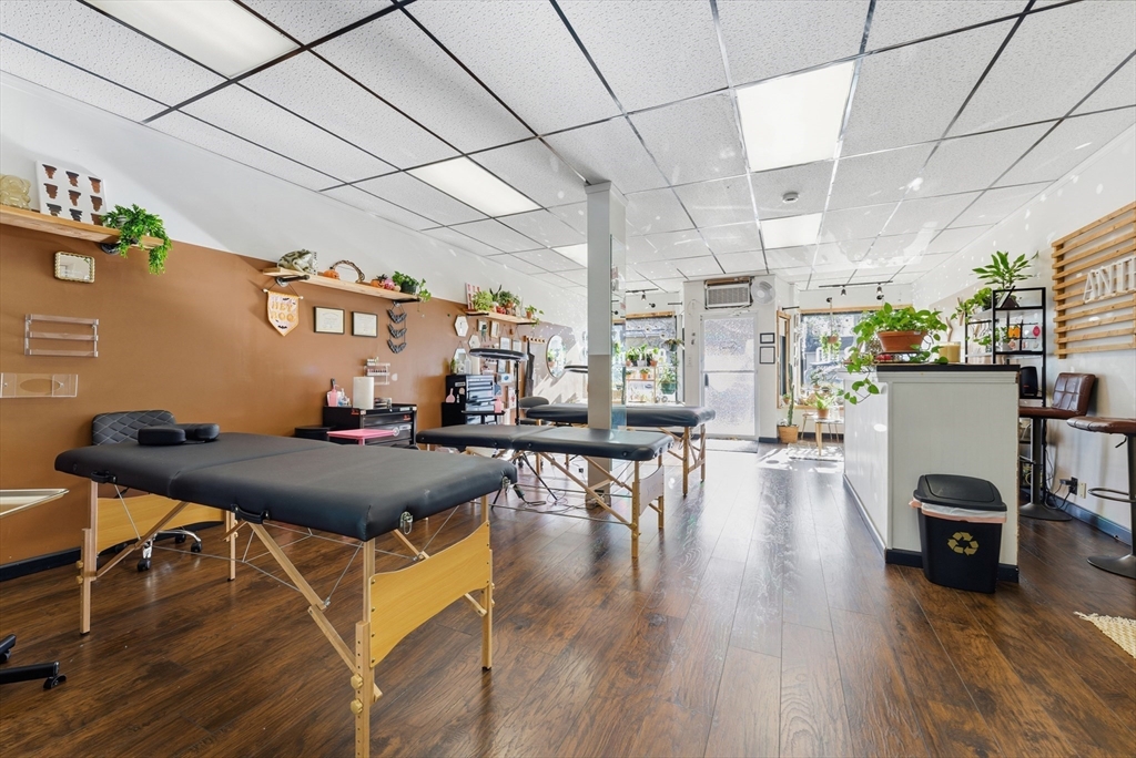 287 East Street Ludlow, MA 01056 - Photo 8 of 42 a living room with lots of furniture and wooden floors
