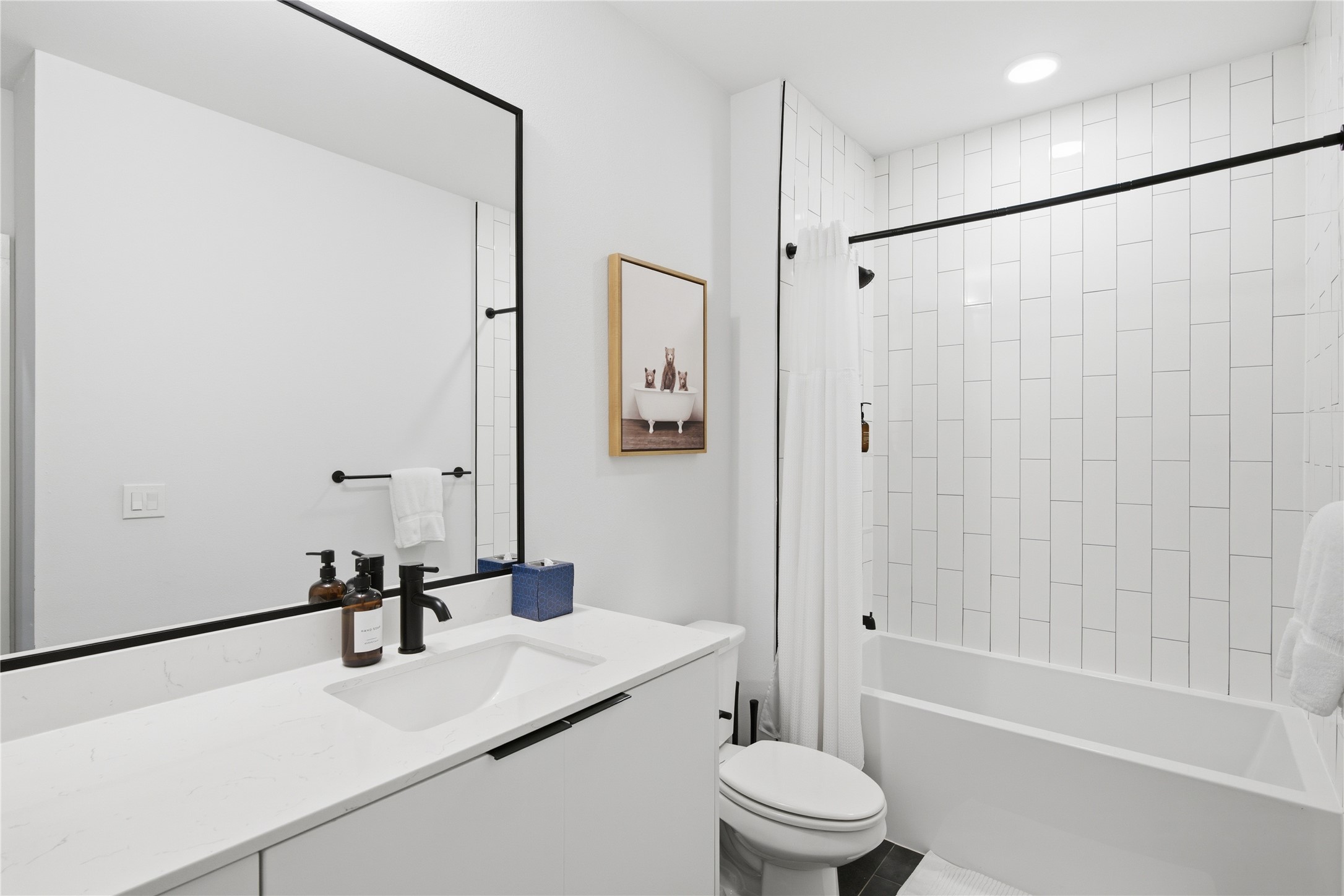 2500 Longview Street, Unit 219 Austin, TX 78705 - Photo 12 of 40 Bathroom featuring shower / tub combo, vanity, and recessed lighting