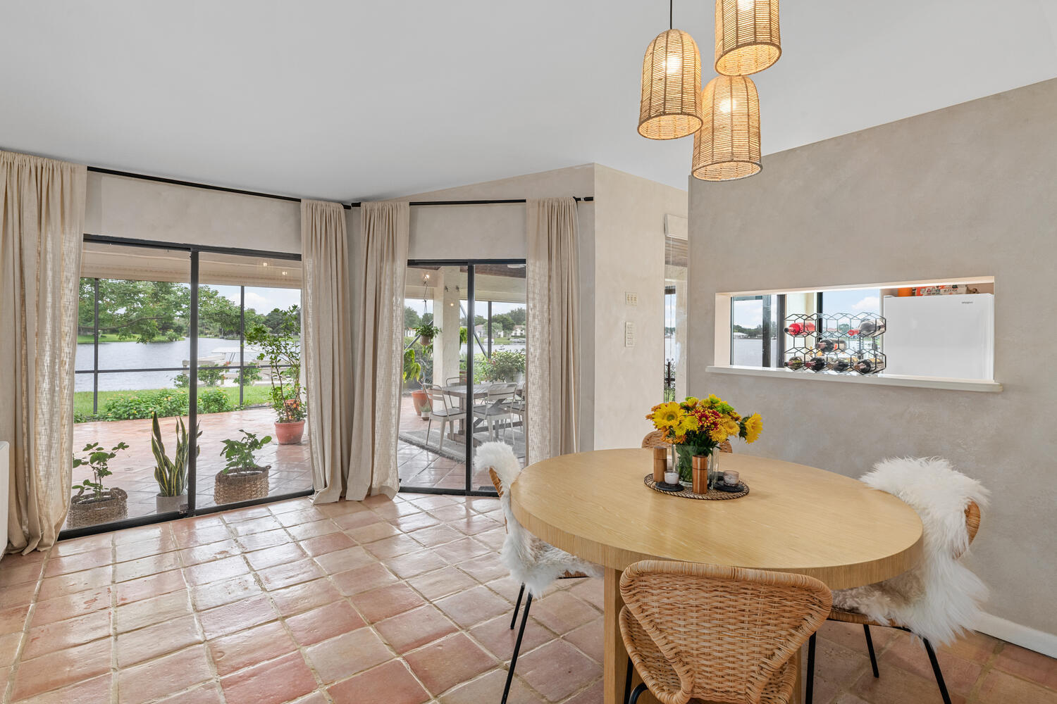 12541 Shoreside Lane Wellington, FL 33414 - Photo 11 of 39 a view of a dining room with furniture wooden floor and chandelier