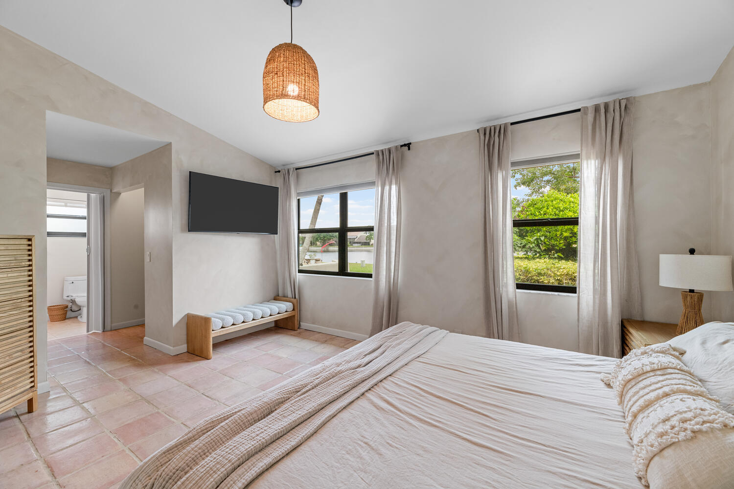 12541 Shoreside Lane Wellington, FL 33414 - Photo 15 of 39 a bedroom with a bed and a window