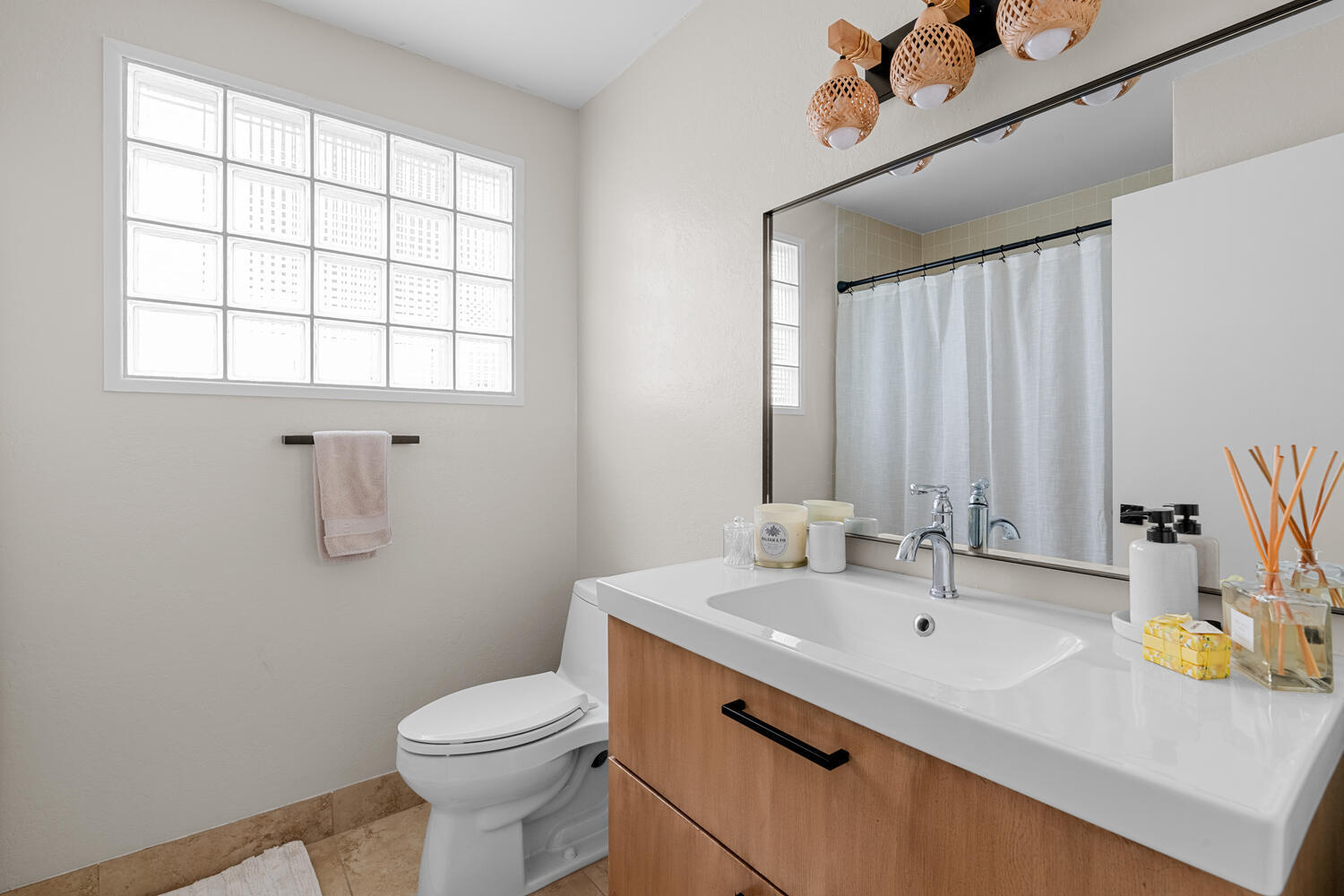 12541 Shoreside Lane Wellington, FL 33414 - Photo 24 of 39 a bathroom with a sink a toilet and mirror