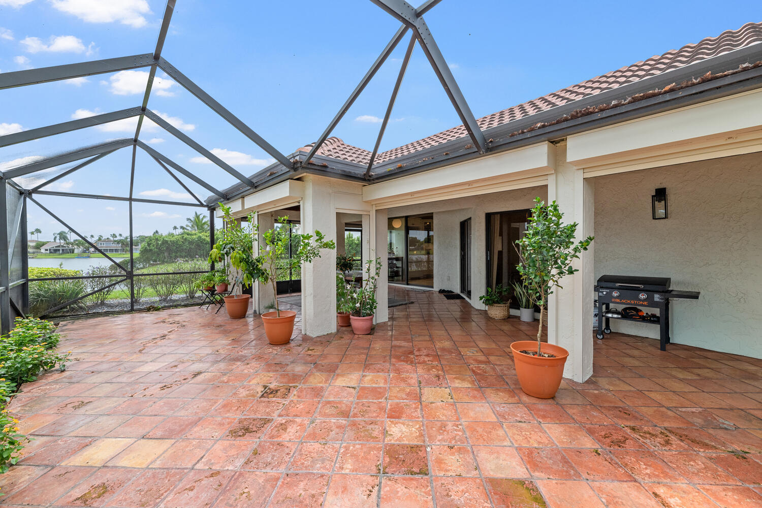 12541 Shoreside Lane Wellington, FL 33414 - Photo 30 of 39 a view of a house with porch and sitting area