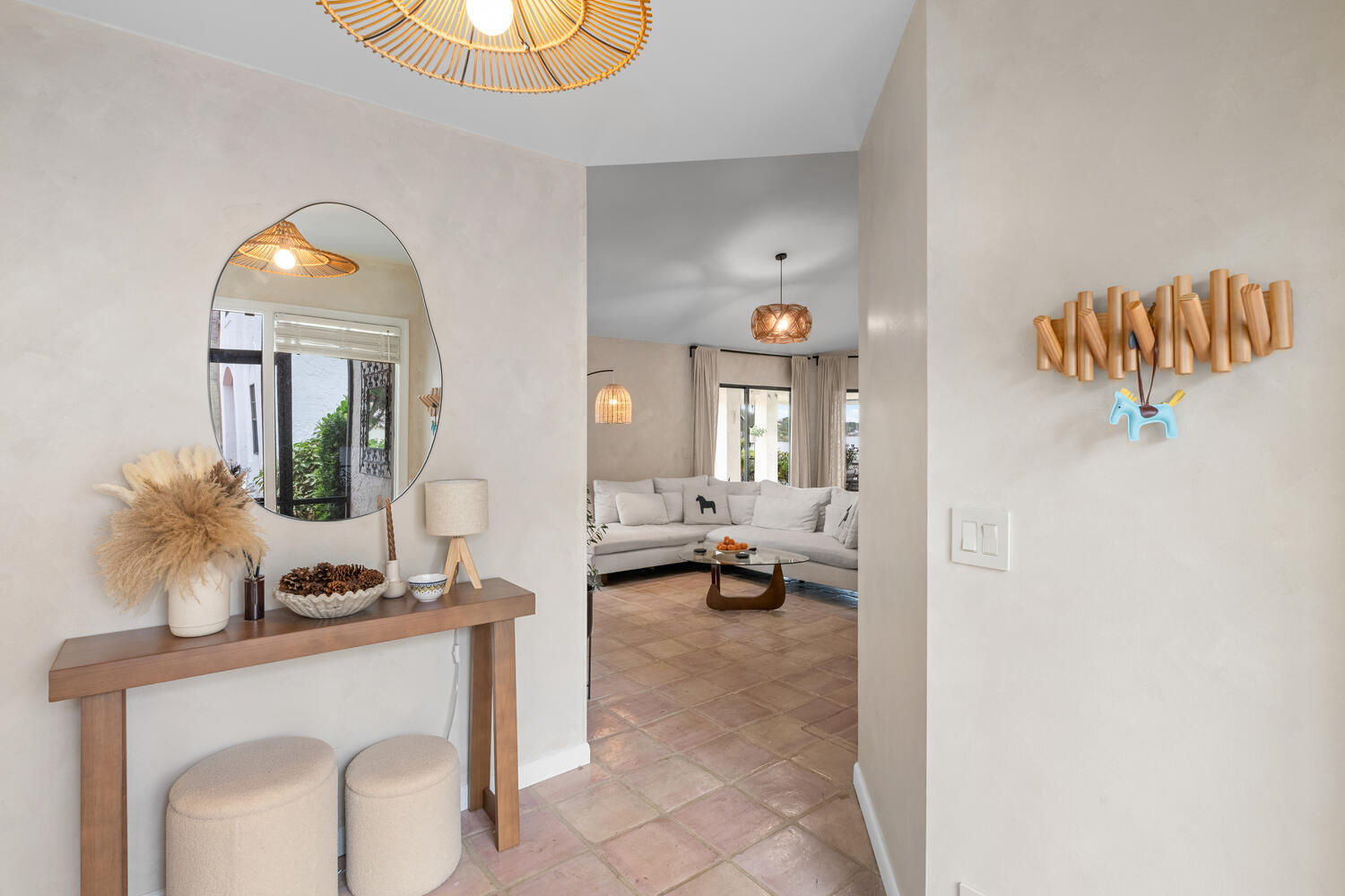 12541 Shoreside Lane Wellington, FL 33414 - Photo 4 of 39 a living room with furniture and a mirror