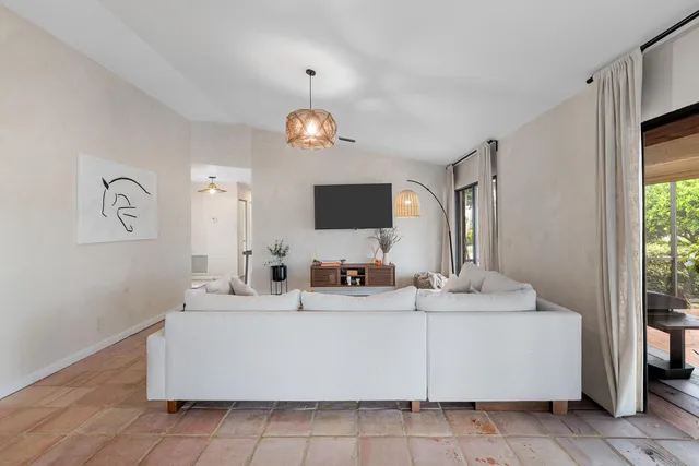 a bathroom with a sink a mirror and a bathtub