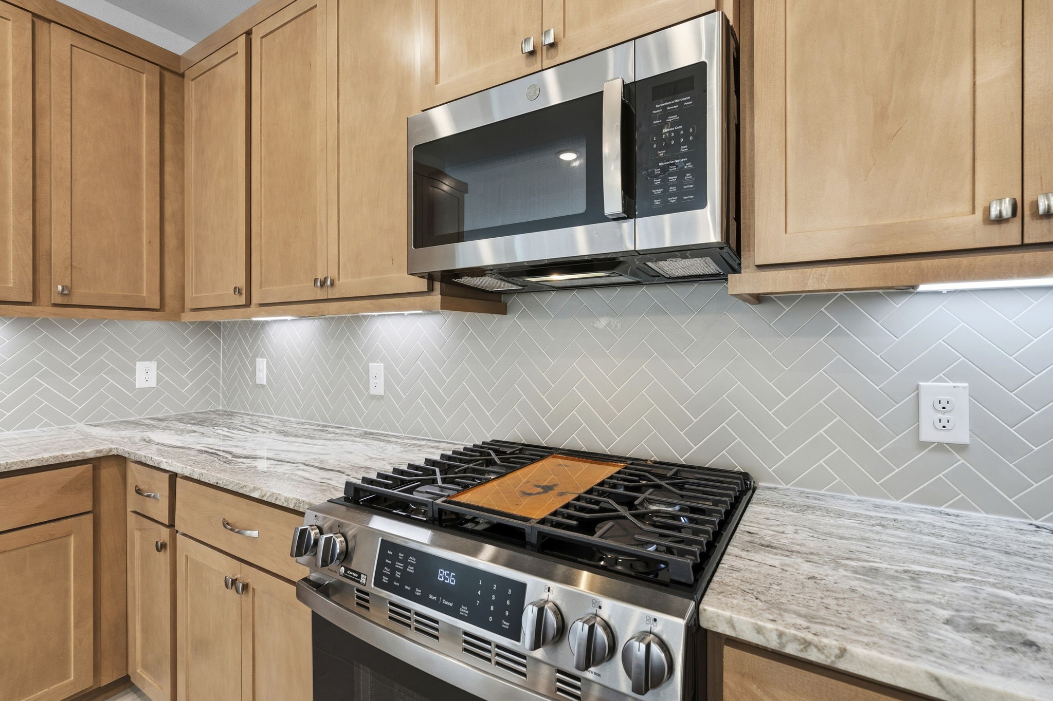 5251 Celestial Court Rosharon, TX 77583 - Photo 17 of 46 a stove top oven sitting inside of a kitchen