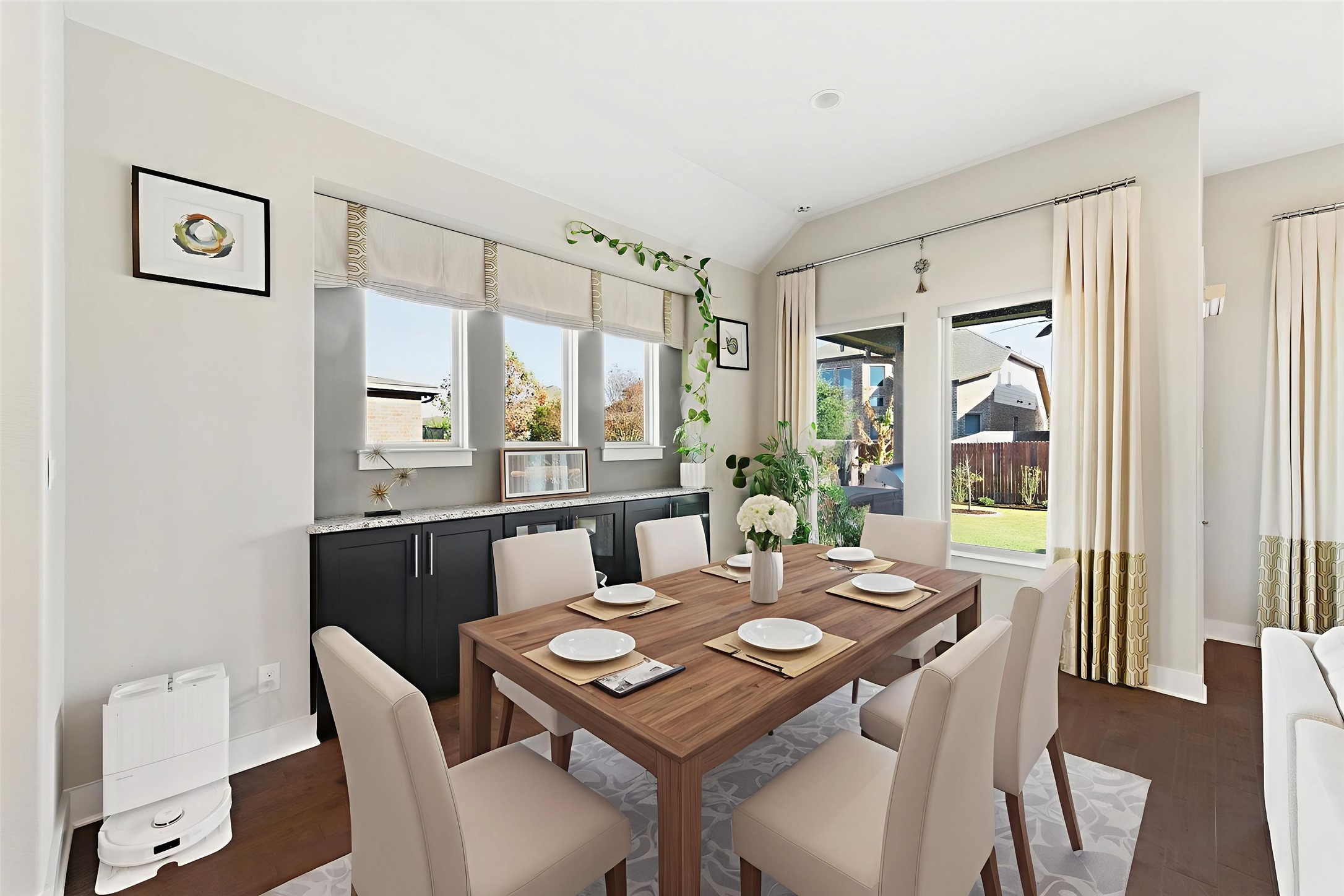 108 Leon Loop Liberty Hill, TX 78642 - Photo 11 of 39 Dining area with lofted ceiling and dark wood-style flooring