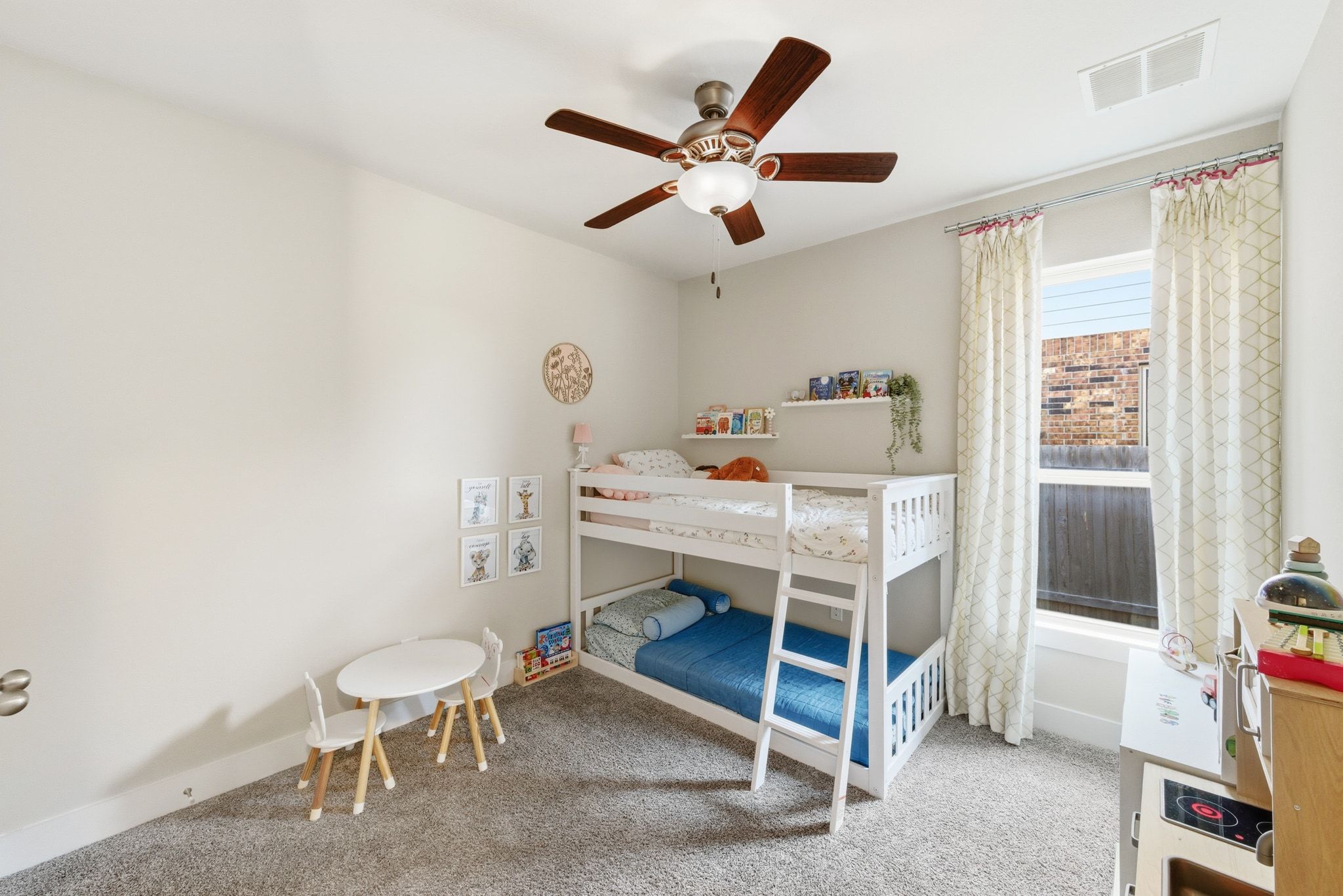 108 Leon Loop Liberty Hill, TX 78642 - Photo 21 of 39 Bedroom featuring light carpet and ceiling fan