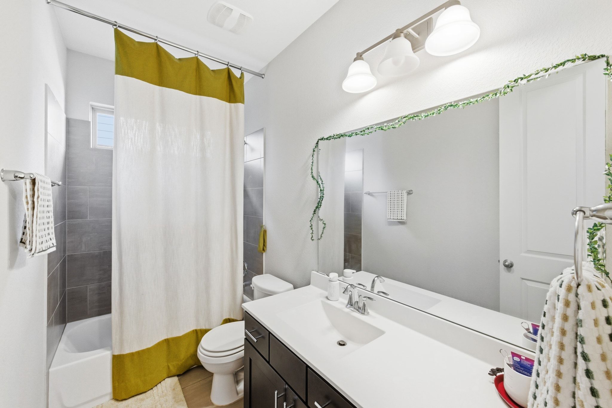 108 Leon Loop Liberty Hill, TX 78642 - Photo 23 of 39 Full bathroom with shower / bath combo and vanity