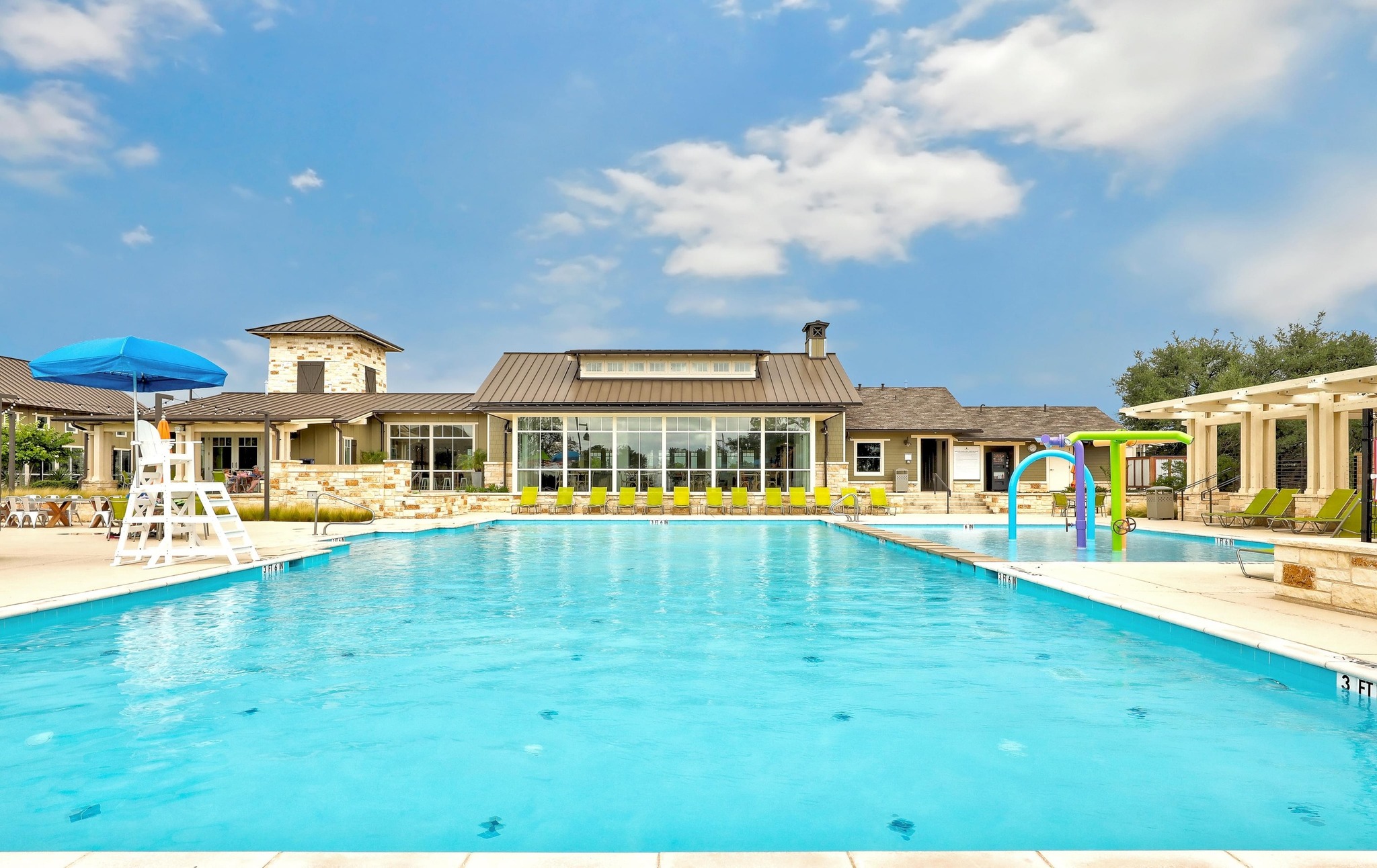 108 Leon Loop Liberty Hill, TX 78642 - Photo 24 of 39 Community pool featuring a patio, a water play area, and a pergola
