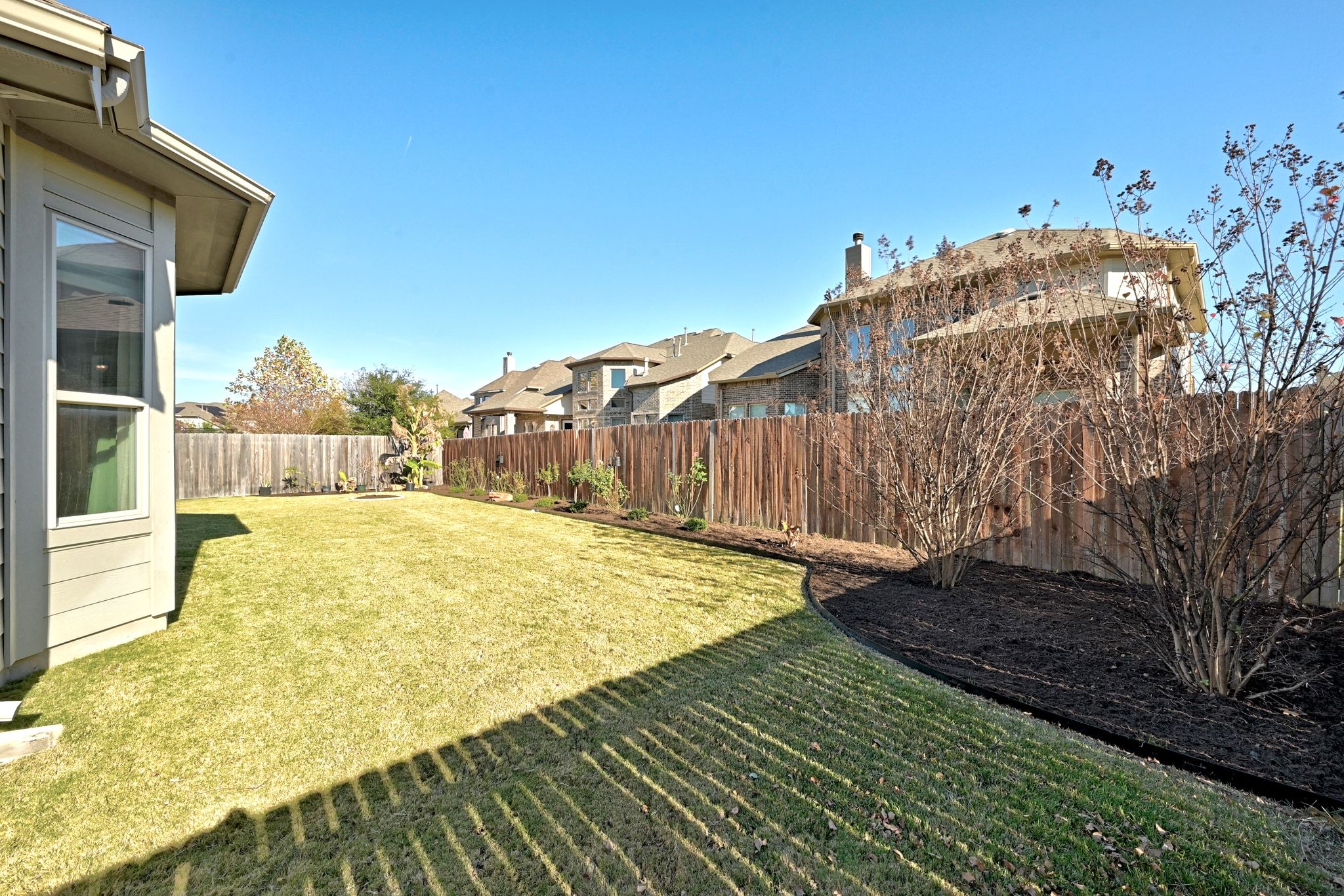 108 Leon Loop Liberty Hill, TX 78642 - Photo 31 of 39 Fenced backyard featuring a residential view