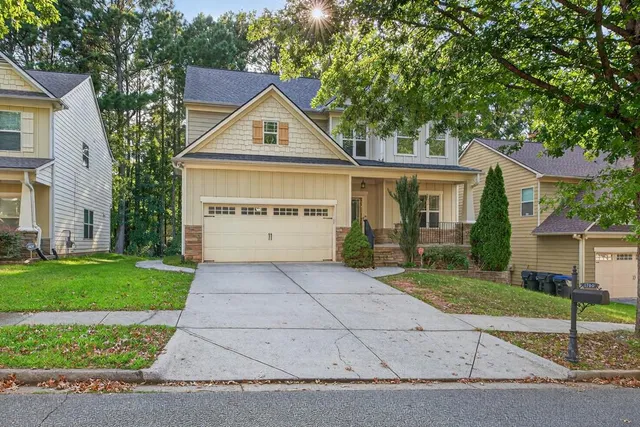 front view of a house with a yard