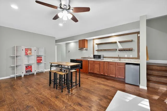 a kitchen with a sink cabinets and counter space