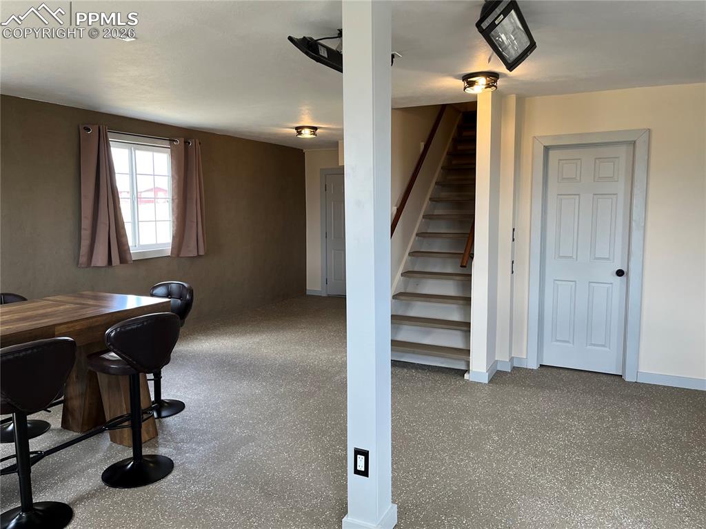 136 Black Knat Road Fairplay, CO 80440 - Photo 26 of 38 a view of a workspace with furniture and staircase