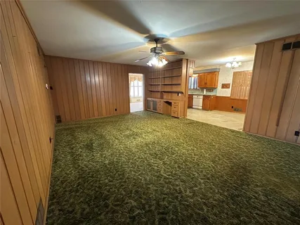 a view of a livingroom with a furniture