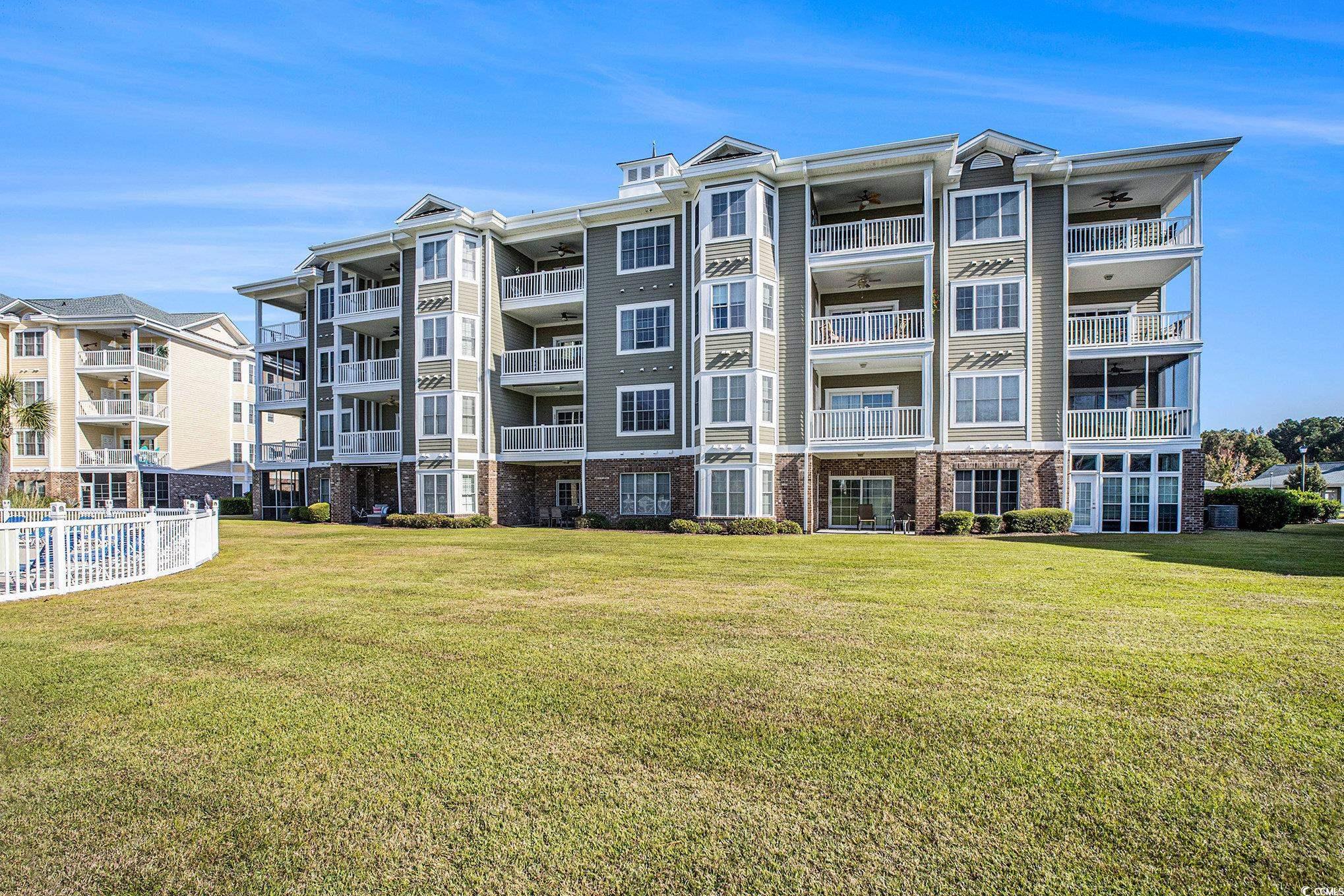 4894 Luster Leaf Circle, Unit 303 Myrtle Beach, SC 29577 - Photo 30 of 31 View of apartment building / complex