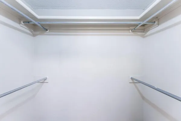 a view of a room with racks on the wall