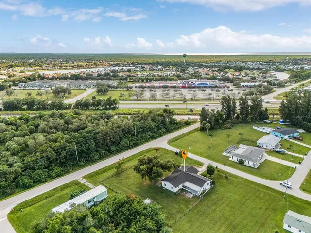 a view of a city with lawn chairs