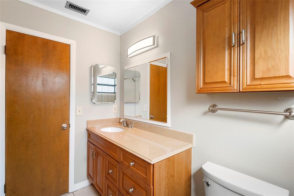 286 Valencia Road DeBary, FL 32713 - Photo 23 of 38 a bathroom with a sink and a mirror