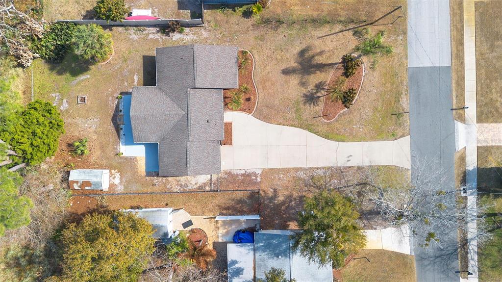 286 Valencia Road DeBary, FL 32713 - Photo 35 of 38 a picture of a house with a yard and sitting area